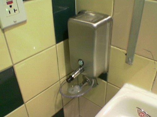 Outdoor hose bib drip-catch tray