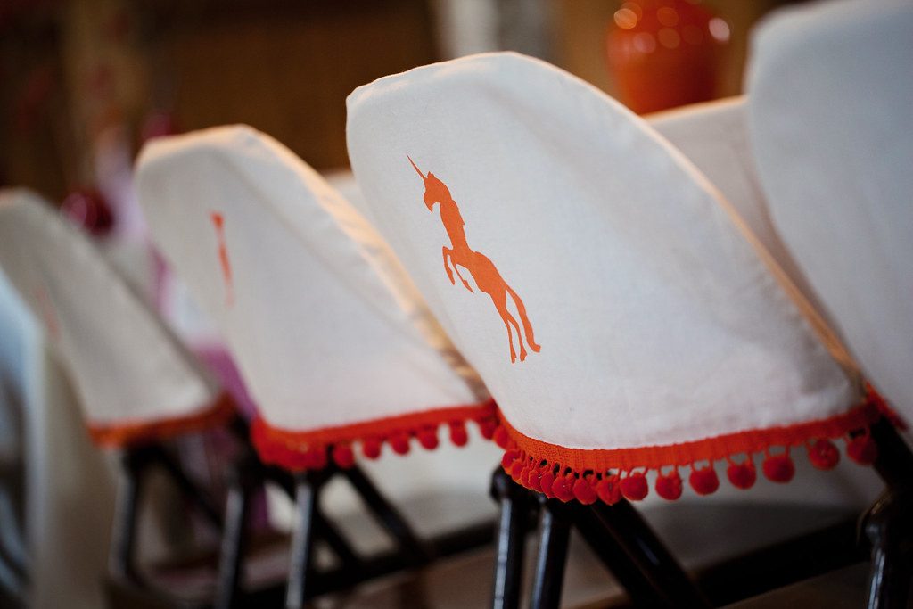 Reusable bunny-ear chair-back covers
